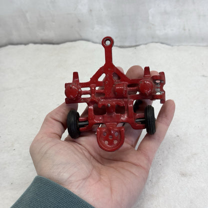 Antique Red Cast Iron Arcade Toy Corn Planter