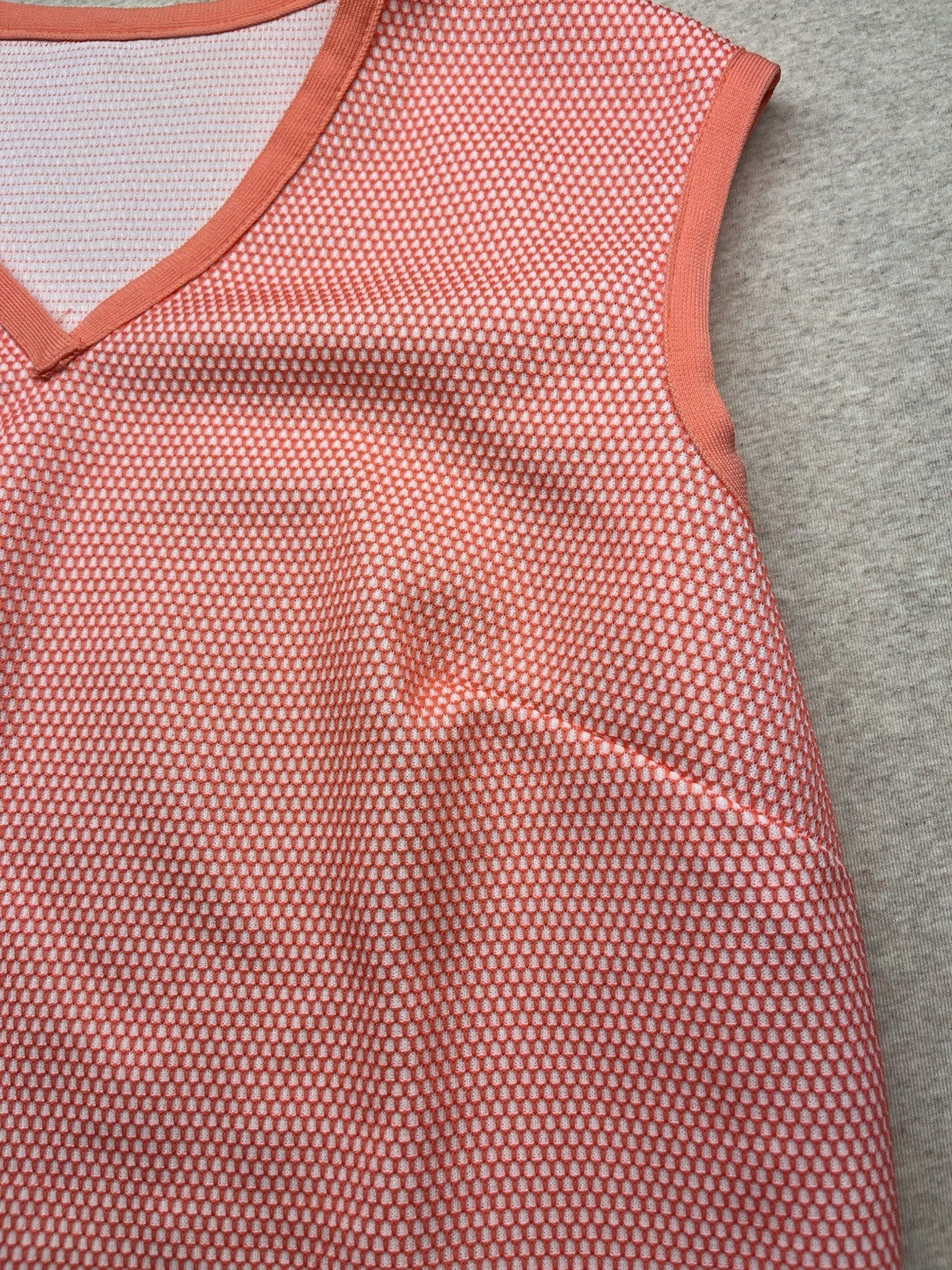 1960s Women’s Orange Knit Sleeveless Shirt