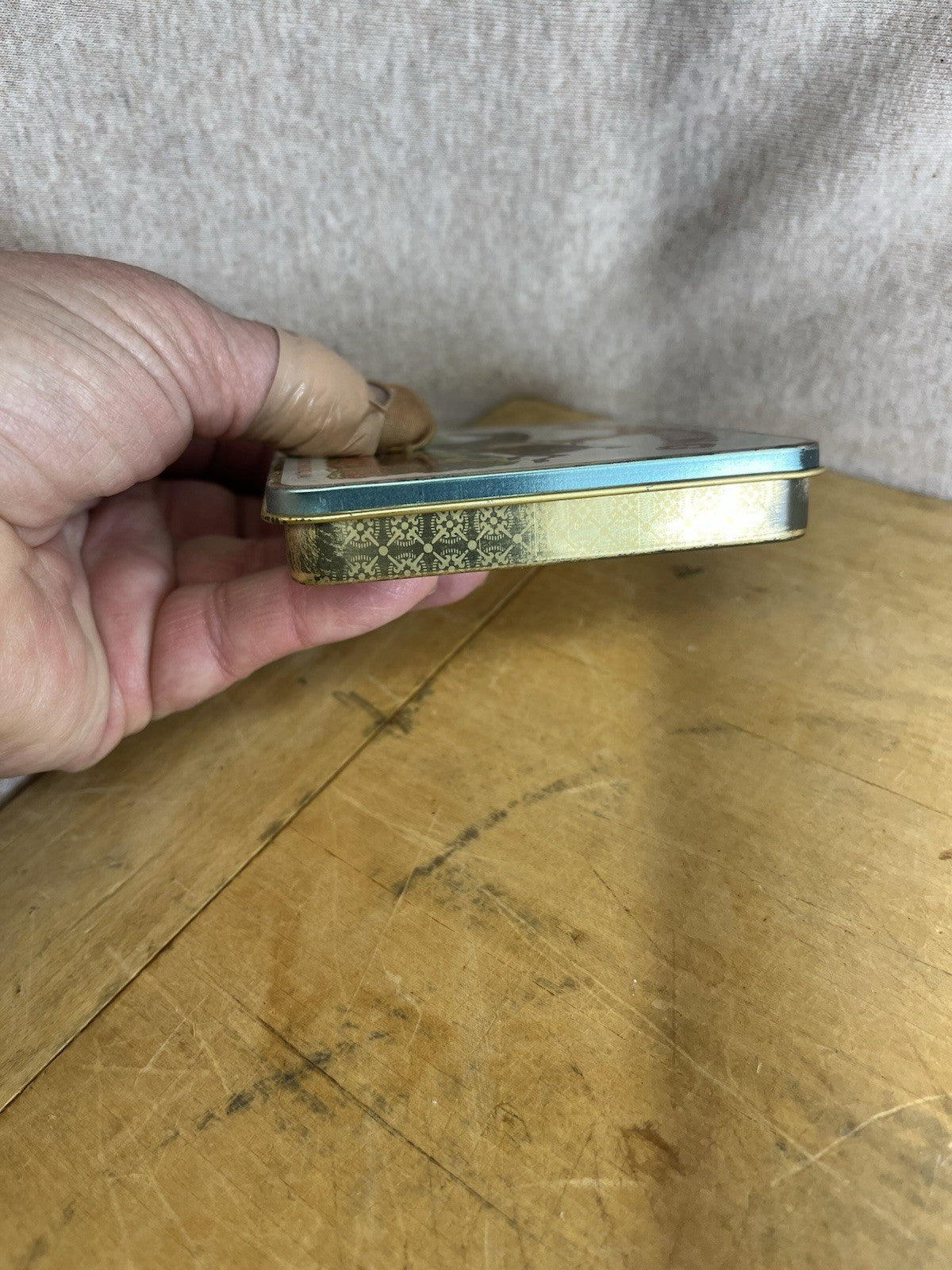 Sporting Empty Cigarette Tin