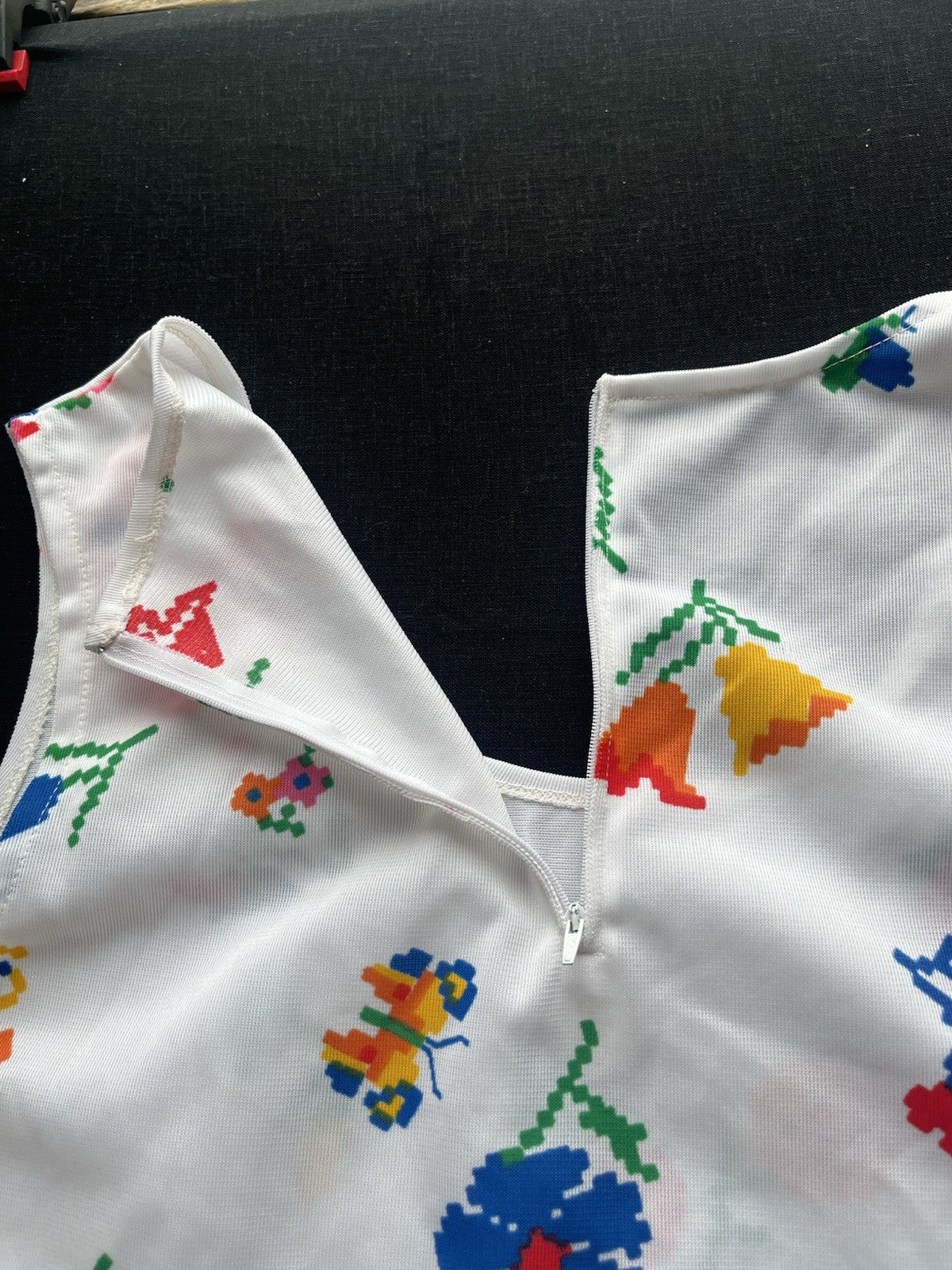 1960s White Flowered Sleeveless Knit Shirt