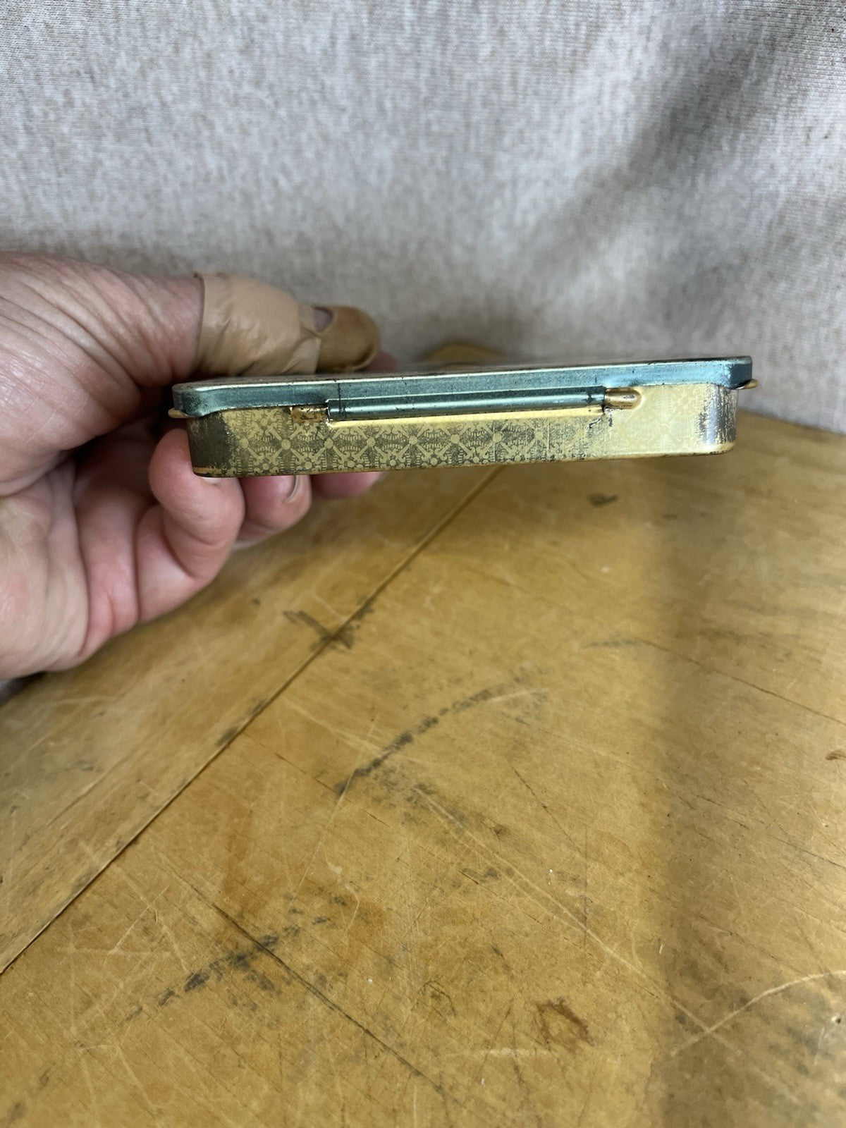 Sporting Empty Cigarette Tin