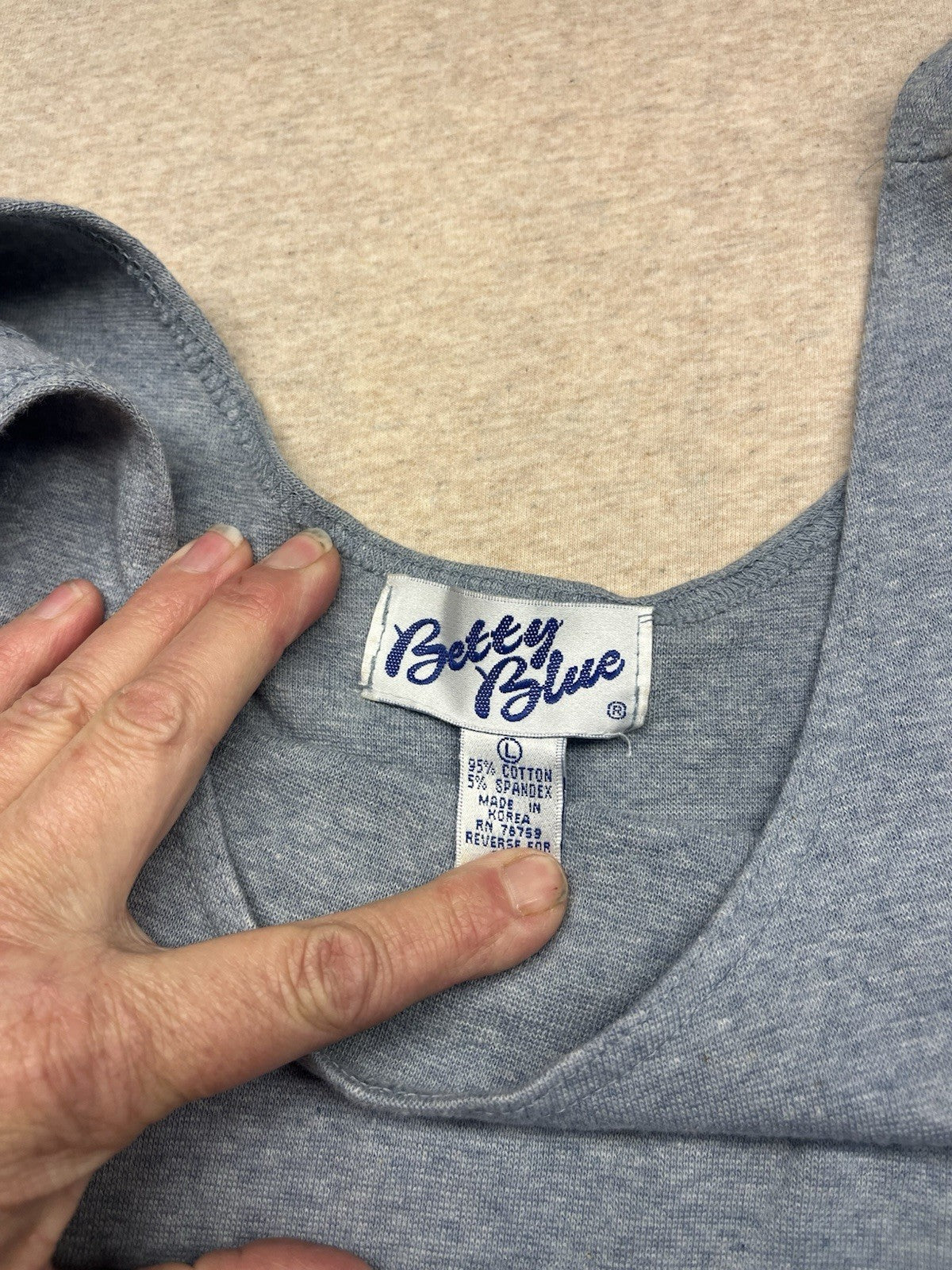 1990s Women’s Blue Sleeveless Knit Body Suit