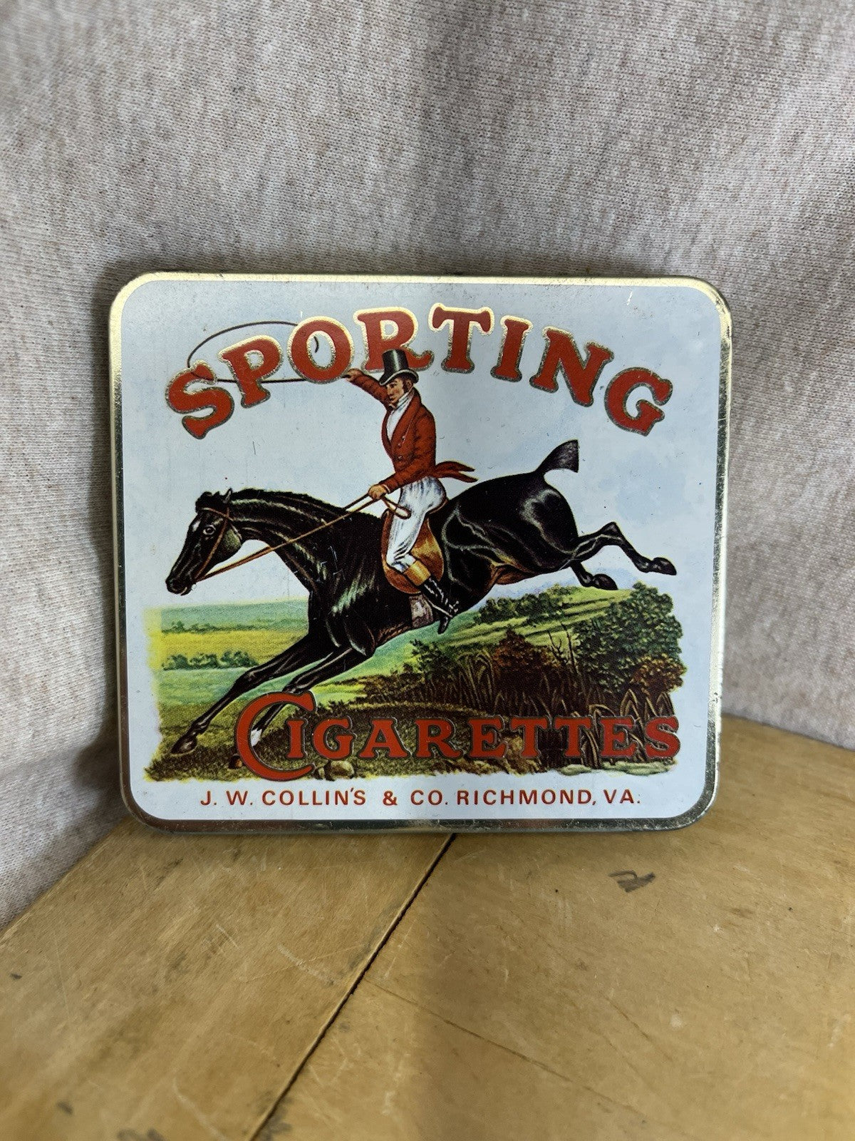 Sporting Empty Cigarette Tin