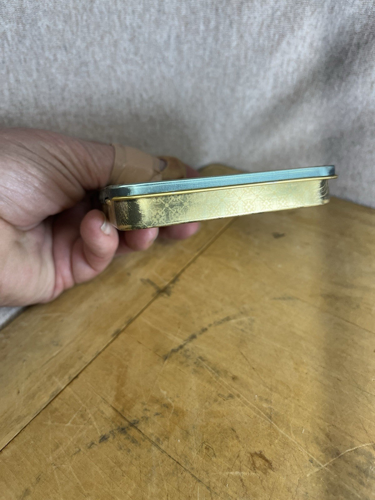 Sporting Empty Cigarette Tin