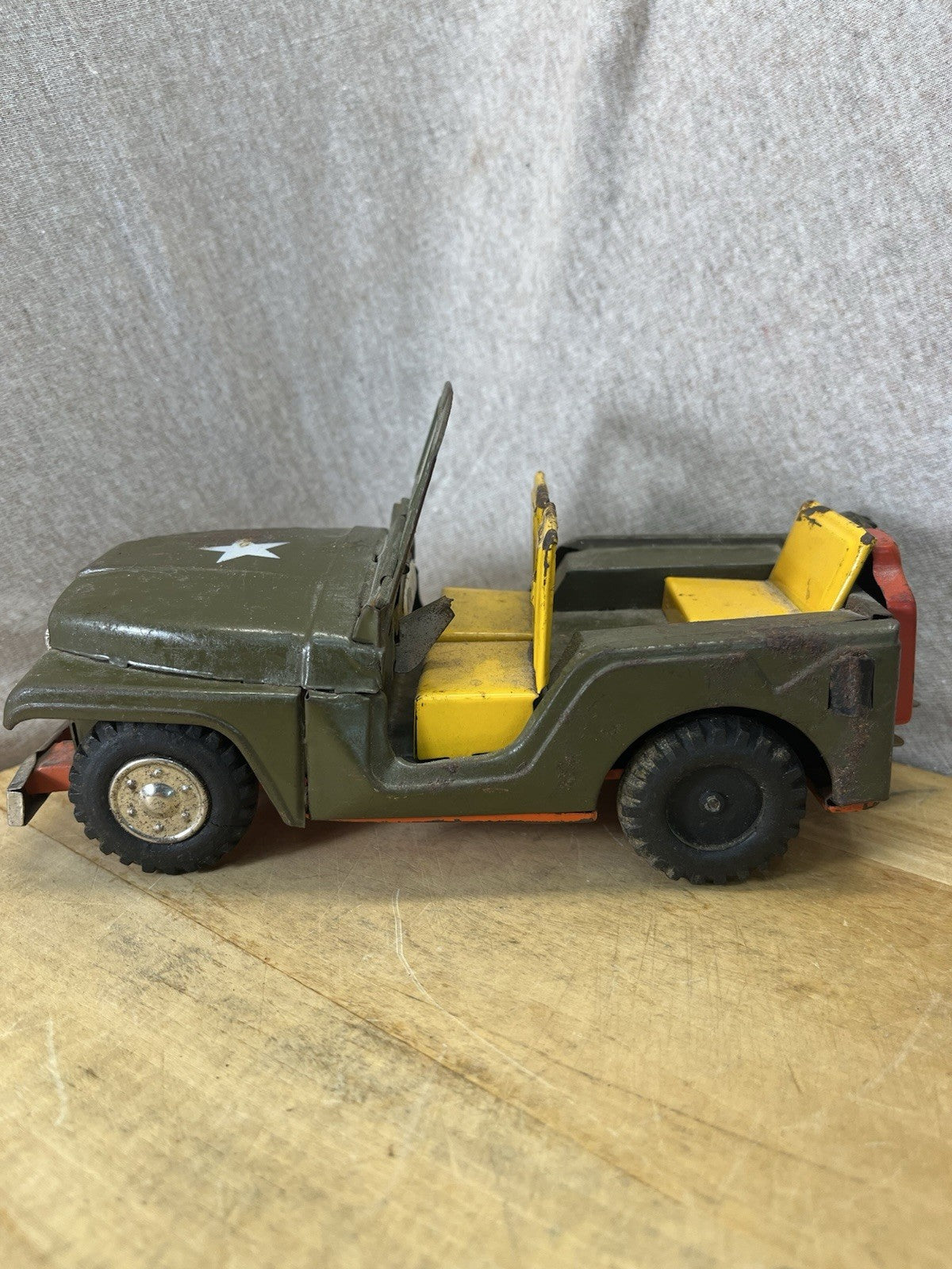 Vintage Tin Friction Jeep W/ Toy Working Spring Howitzer Gun