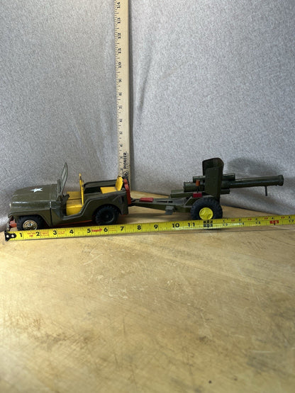 Vintage Tin Friction Jeep W/ Toy Working Spring Howitzer Gun